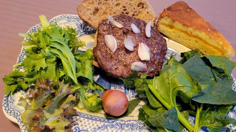 Dinner with items from five oxford winter vendors includes 5 Oaks lettuce, 7 wonders spinach, Stoney Hedgerow shallots, Caraway Farm hamburger and Birch Creek bread cake. CONTRIBUTED