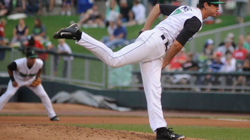 Dragons starting pitcher Tyler Mahle delivers. The Dragons defeated the visiting Bowling Green Hot Rods (Rays) at Dayton’s Fifth Third Field on Thursday, July 9, 2015. MARC PENDLETON / STAFF