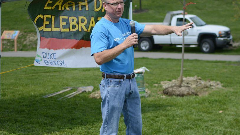 The city of Fairfield will celebrate Earth Day on Monday with a tree planting ceremony. Pictured is Tim Abbott, a Fairfield City Council member and Duke Energy employee, during the city’s annual Earth Day celebration in April 2017. Trees were donated by Duke Energy via a grant. MICHAEL D. PITMAN/STAFF