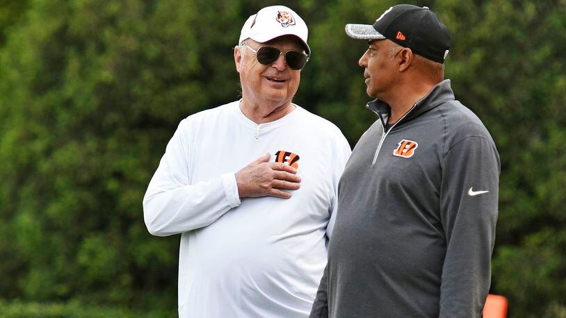 Head coach Marvin Lewis, right, and owner Mike Brown stand on the sideline during rookie camp for the Cincinnati Bengals Friday, May 6 at the practice fields next to Paul Brown Stadium in Cincinnati. NICK GRAHAM/STAFF