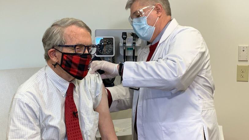 Dr. Kevin Sharrett of Kettering Health administered the coronavirus vaccine to Gov. Mike DeWine on Tuesday, Feb. 2, 2021. Both the governor and his wife, Fran DeWine, have received their first dose. Photo courtesy Gov. Mike DeWine's Office.