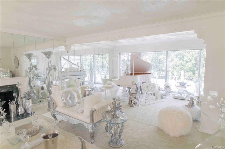 Photos: Inside $550K Lion Gate Estate, whimsical home with carpeted ceilings, vintage cars