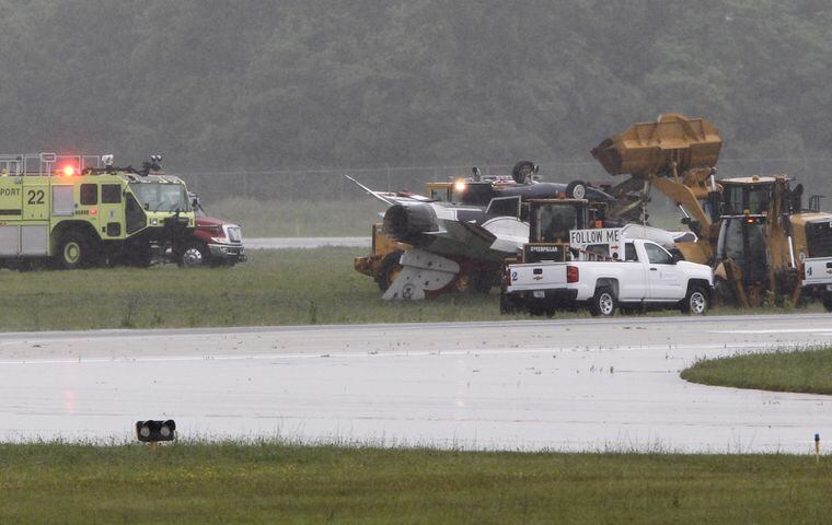 PHOTOS: Thunderbird flips on its top at Dayton Air Show
