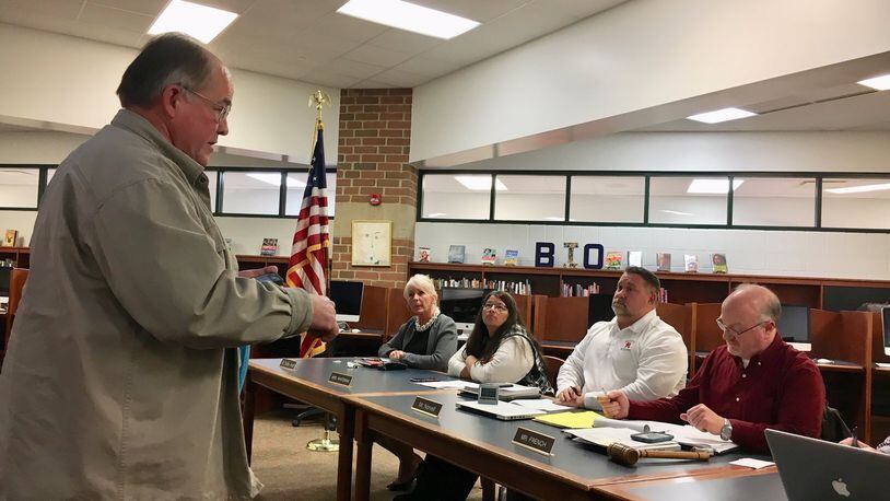 Madison Schools resident Bill Ison, who is also a plaintiff in a lawsuit against the district’s school board claiming members are restricting free speech at public meetings, criticizes the board during Tuesday’s meeting. Ison has been a lead critic of Madison’s program of arming some school staffers as part of the district’s security plan.