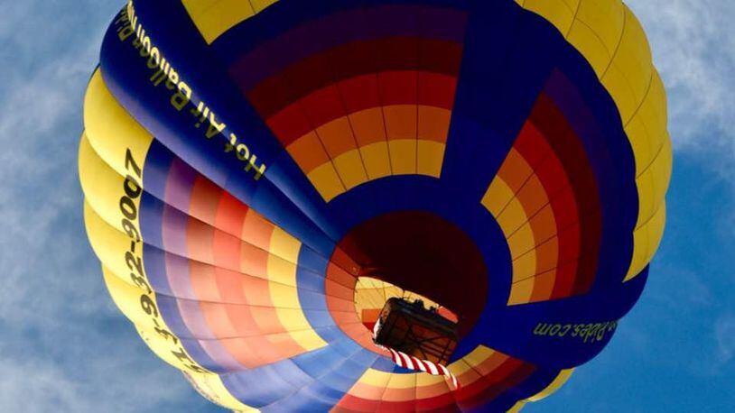 Organizers estimated about 15,000 people attended the Ohio Challenge hot air balloon festival in Middletown on July 17 after inclement weather grounded the balloonists and skydivers the previous night. FILE PHOTO