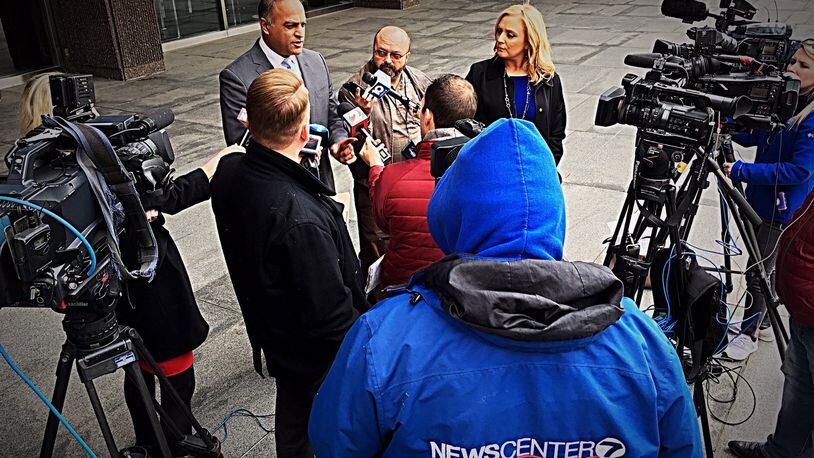 First Assistant U.S. Attorney Vipal Patel, center, speaks to the media after a plea agreement hearing in which Ethan Kollie, a Kettering man who had been a friend to Oregon District shooter Connor Betters, pleaded guilty Wednesday to firearms charges. MARSHALL GORBY/STAFF