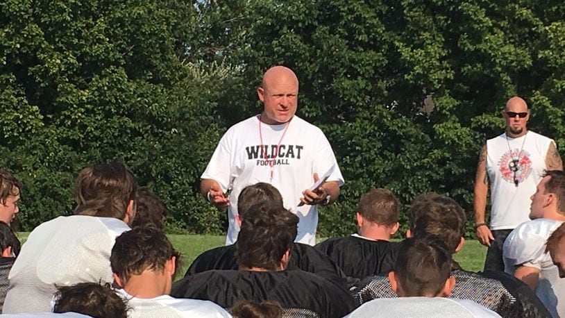 Franklin coach Brad Childers speaks to his team after a recent practice at the school. RICK CASSANO/STAFF