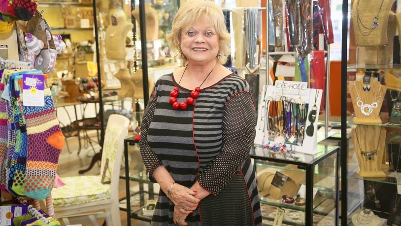 Sherry Armstead has rebranded her former Art On Symmes store in Fairfield as Symmetry Boutique & Gallery. She is pictured in her former Hamilton store, Art Off Symmes, which closed in December 2017.
