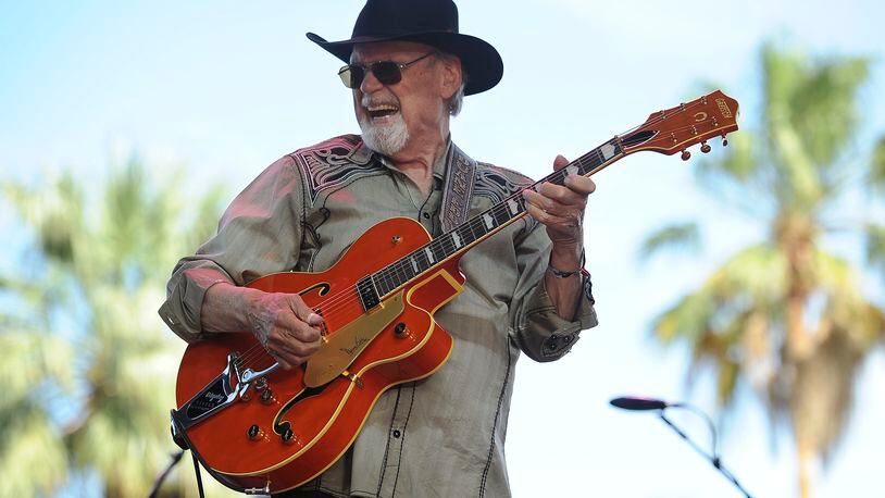 FILE - Duane Eddy performs on the third day of the 2014 Stagecoach Music Festival at the Empire Polo Field, April 27, 2014, in Indio, Calif. Eddy, a pioneering guitar hero whose reverberating electric sound on instrumentals such as "Rebel Rouser" and “Peter Gunn” helped put the twang in early rock 'n' roll and influenced George Harrison, Bruce Springsteen and countless other musicians, died of cancer Tuesday, April 30, 2024. He was 86. (Photo by Chris Pizzello/Invision/AP, File)