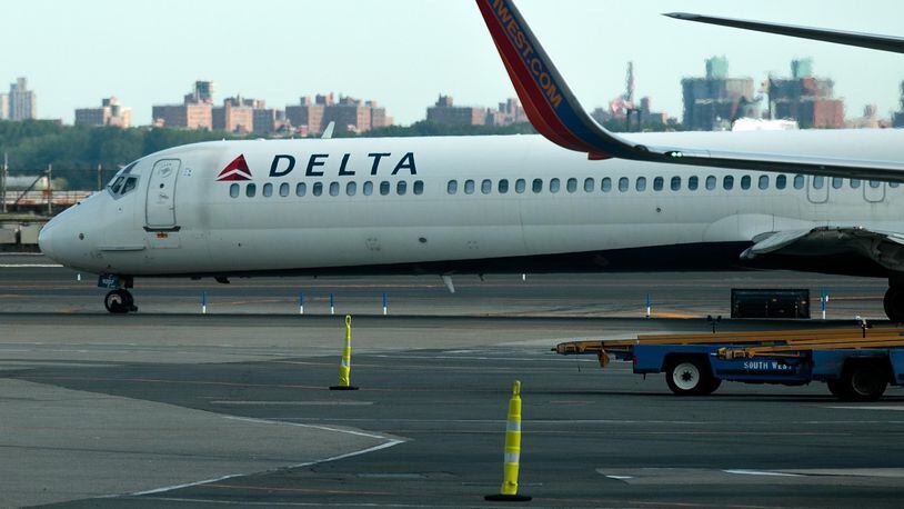 FILE PHOTO: A Delta jet taxis on the tarmac.