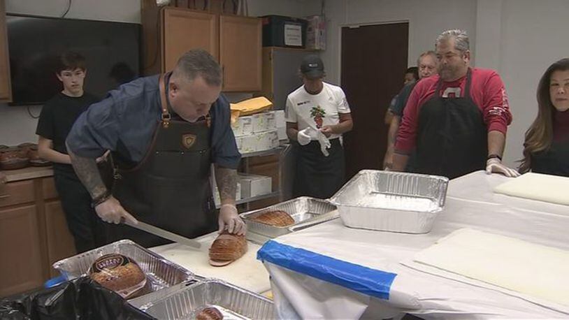 Florida businessman Eric Holm is providing free Thanksgiving meals to more than 15,000 people at the Salvation Army on Thursday.