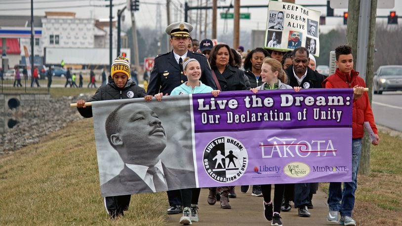 FILE PHOTO: While some live Martin Luther King Jr. commemorative events scheduled for our area Monday have been canceled, others have been altered and or are moving to online, virtual events. Among those are West Chester Twp.'s annual MLK March (pictured), which in past years has drawn some of the largest number of participants. (File Photo\Journal-News)
