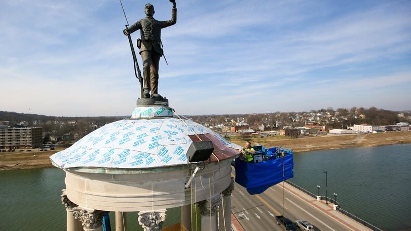 The Soldiers Sailors and Pioneers monument in downtown Hamilton is getting a new copper dome, a contingency not originally contemplated in the $361,000 restoration project. The new covering is expected to cost $72,000. GREG LYNCH / STAFF
