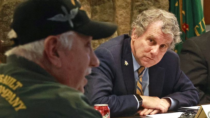 Senator Sherrod Brown listens to veteran Steve Ratcliffe during a round table discussion between Sen. Brown and local veterans Wednesday, Jan. 11, 2023, at VFW Post 1031 in Springfield. BILL LACKEY/STAFF