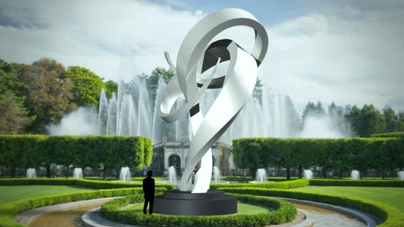 This 25-foot-tall sculpture of brushed stainless steel called Embrace is planned in 2020 for Hamilton’s intersection of Main Street with Millville and Eaton avenues. PROVIDED