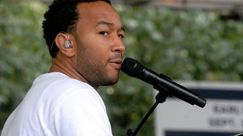 John Legend performs in Springfield for a Barack Obama campaign rally. Staff photo by Marshall Gorby