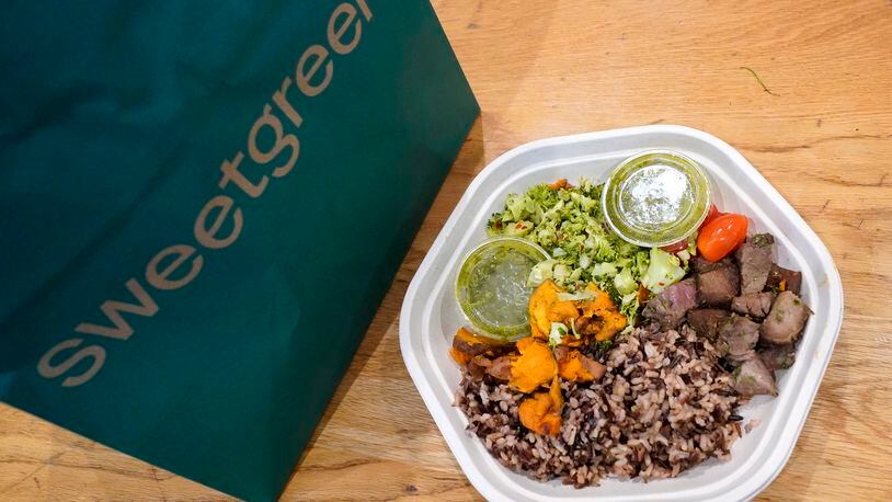 Sweetgreen's new caramelized garlic steak bowl sits on the table on Thursday, May 9, 2024, in New York. The announcement of Sweetgreen that it’s adding beef to its menu led to strong reactions online, with customers questioning the company’s carbon neutral plans. (AP Photo)