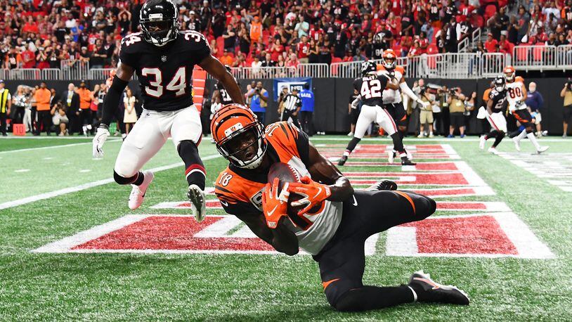 ATLANTA, GA - SEPTEMBER 30: A.J. Green #18 of the Cincinnati Bengals catches the game winning touchdown pass during the fourth quarter against the Cincinnati Bengals at Mercedes-Benz Stadium on September 30, 2018 in Atlanta, Georgia. (Photo by Scott Cunningham/Getty Images)