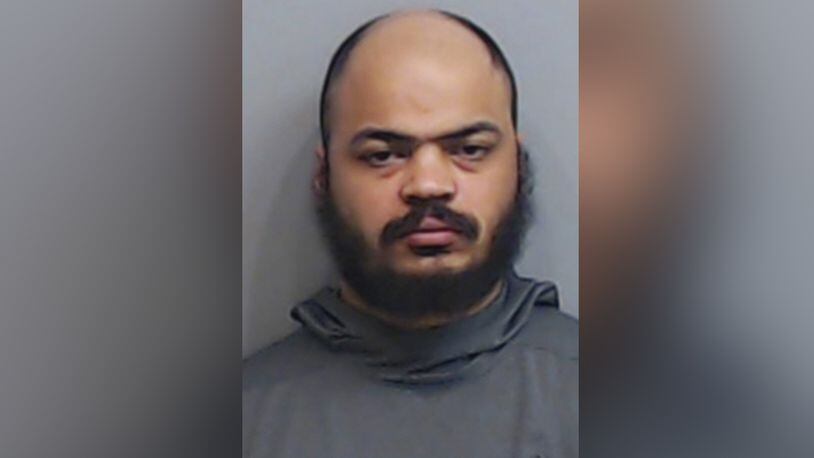 Darryl Bynes is charged with murder for allegedly shooting and killing a teenager who knocked on his door. (Fulton County Sheriff's Office via WSBTV.com)