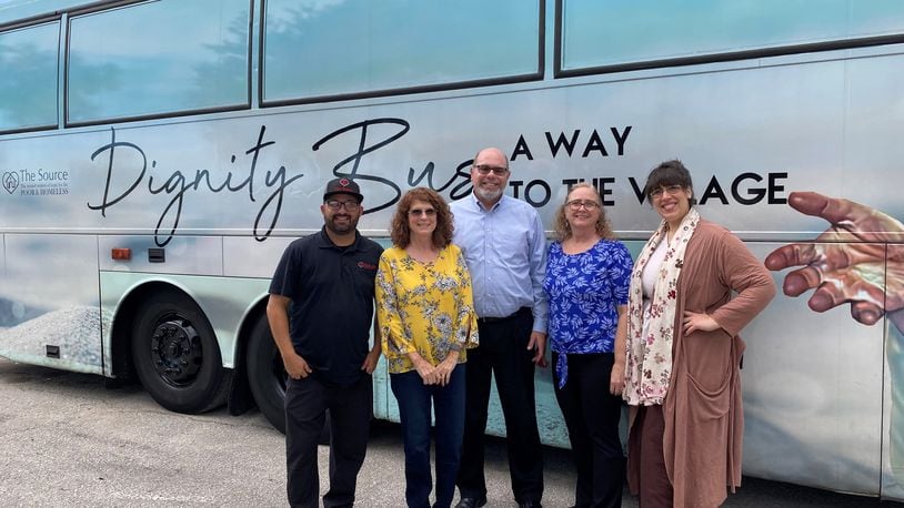 A group of officials from Butler County traveled to Vero Beach, Fla. recently to tour a Dignity Bus that houses the homeless and provides support services. Pictured here from left to right: Tony Zorbaugh, executive director of The Source; Cindy Carpenter, Butler County Commissioner; Jeffrey Diver, executive director of SELF; Gayle Drexler, program director at SELF; and Elizabeth Slamka, Middletown community volunteer.