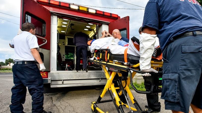 Middletown is reported a 49 percent in heroin overdoses in 2018 over 2017. FILE PHOTO In this June 2017 file photo, Middletown paramedics and police officers responded to a drug overdose. Rapid response teams that contact recent overdose victims and help connect them with treatment are being funded across Ohio by 21st Century Cures Act money. NICK GRAHAM/STAFF