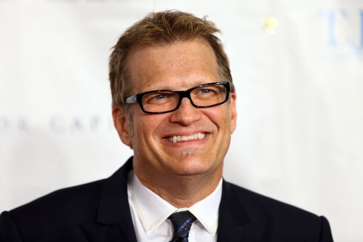 Drew Carey was born with 6 toes on his right foot.