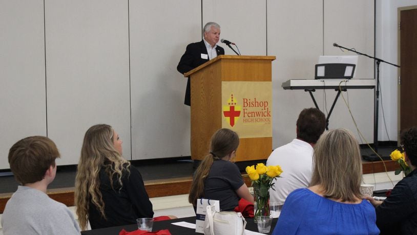 Pete Dobrozsi, a 1963 Fenwick High School graduate addresses students and scholarship donors Wednesday morning during the Scholarship Breakfast. The Dobrozsi family awards two $1,500 scholarships annually to assist students with tuition. All five Dobrozsi children graduated from Fenwick. CONTRIBUTED