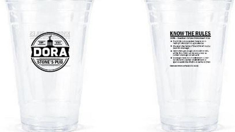 These images of a cup, front and back, give an idea what the DORA cups would look like, with the name of a participating business that sold the cup, as well as rules for strolling around with the cups outdoors in Hamilton’s downtown. PROVIDED