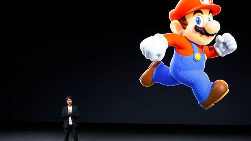 Shigeru Miyamoto, creator of Super Mario, speaks on stage during an event. (Photo by Stephen Lam/Getty Images)