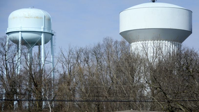 The 1.5 million-gallon water tank (right) on Seward Road will be cleaned, repaired and repainted this year and a submersible mixer will be installed. City Council is expected to award contracts on Monday. MICHAEL D. PITMAN/STAFF
