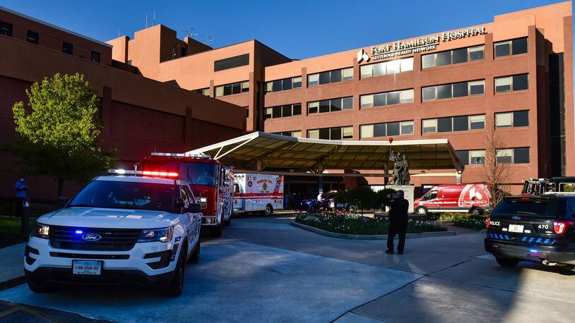 Some young people are among the new patients with the novel coronavirus. Pictured are police and fire department vehicles lining up in front of Kettering Health Network’s Fort Hamilton Hospital last month to thank healthcare workers during the pandemic. NICK GRAHAM/FILE