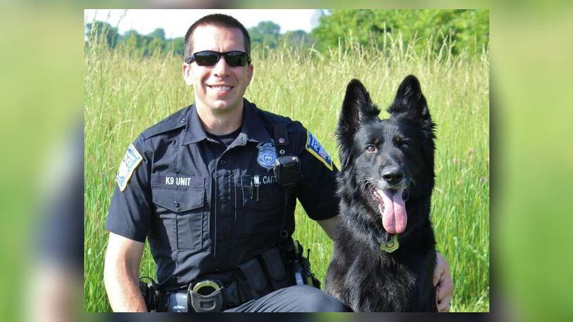 Middletown Division Of Police Officer Marco Caito and K9 Aki. MIDDLETOWN DIVISION OF POLICE