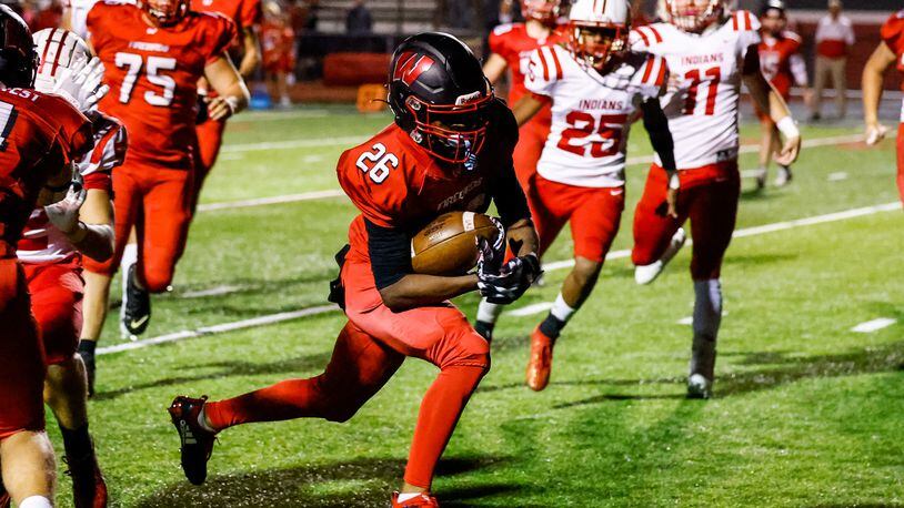 Lakota West's Jiovionni Wilson runs in for a touchdown during their football game against Fairfield Friday, Oct. 1, 2021 at Lakota West High School in West Chester Township. Lakota West won 42-10. NICK GRAHAM / STAFF