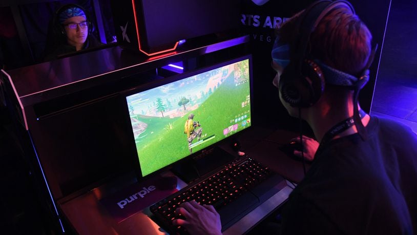 Gamers play "Fortnite" during Ninja Vegas '18 at Esports Arena Las Vegas at Luxor Hotel and Casino on April 21, 2018 in Las Vegas, Nevada.  In Jan. 2018, Florida authorities said a man used "Fortnite" to to solicit a child for pornographic images.