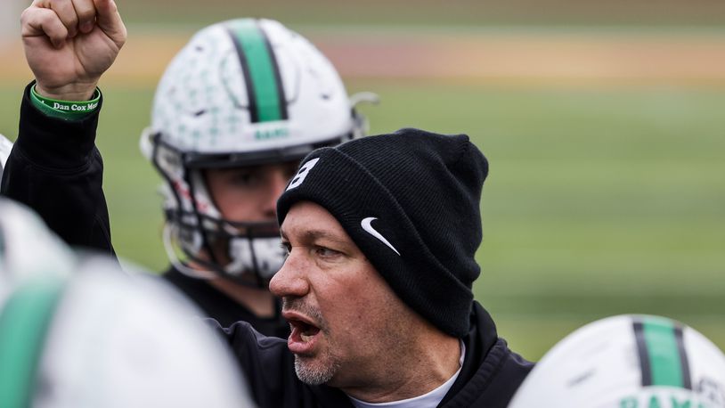 The Badin Rams head football coach Nick Yordy speaks to the team during practice Tuesday, Nov. 30, 2021 at Ross High School. The Rams play Chardon Friday in the state championship game in Akron. NICK GRAHAM / STAFF