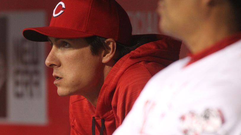 Reds pitcher Homer Bailey watches a game against the Cubs on Friday, April 22, 2016, at Great American Ball Park in Cincinnati. David Jablonski/Staff