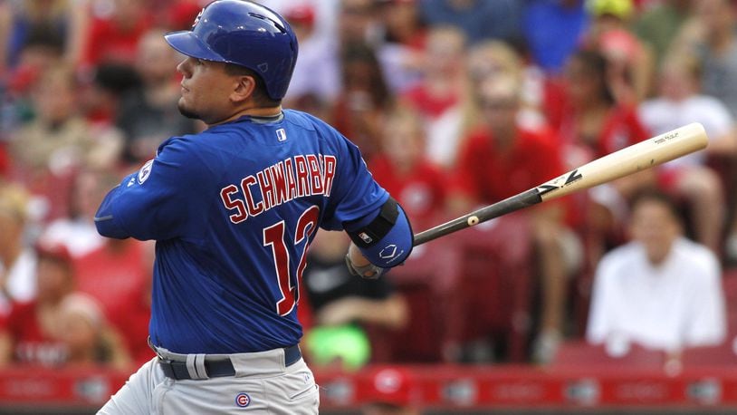 The Cubs’ Kyle Schwarber singles in the first inning against the Reds on Monday, July 20, 2015, at Great American Ball Park in Cincinnati. DAVID JABLONSKI/STAFF