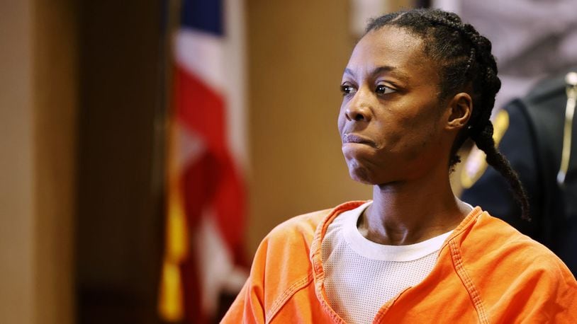 Mia Harris, who is charged with multiple counts of felonious assault for allegedly shooting her infant granddaughter in the head last month at a Liberty Twp residence, pleaded not guilty by reason of insanity during arraignment Tuesday in Butler County Common Pleas Court. NICK GRAHAM/STAFF