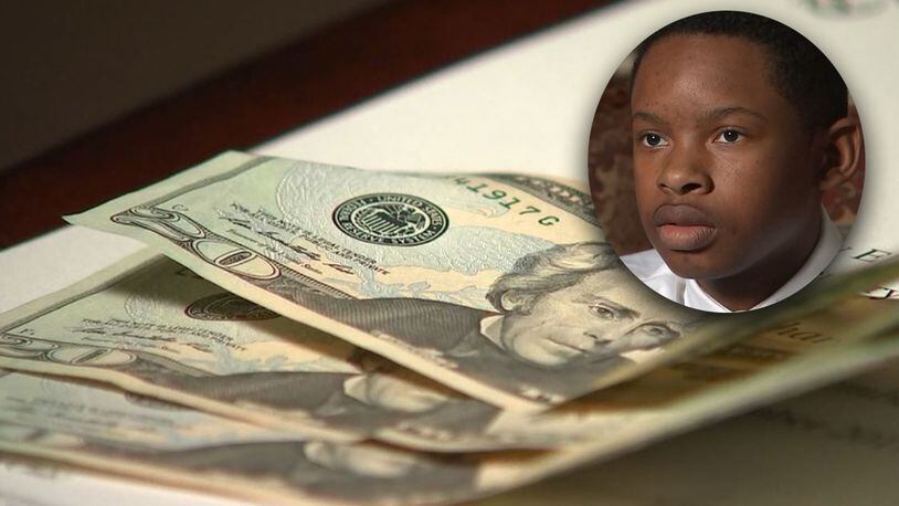 A middle school honor student was suspended for paying for his lunch with money that turned out to be counterfeit. He and his parents said they had no idea the $20 bill was fake (WSBTV.com)