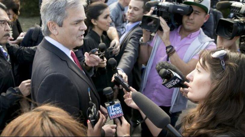 Austin Mayor Steve Adler talks to reporters in the Travis Country neighborhood on Monday after a bomb exploded seriously injured two men.