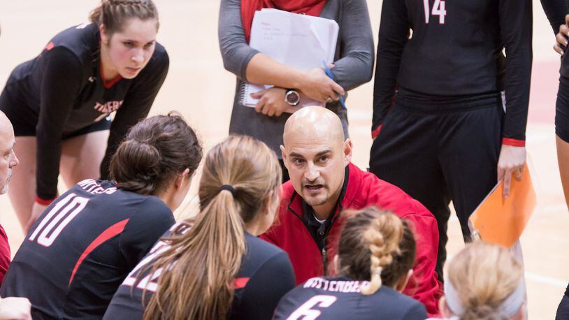 Wittenberg volleyball coach Paco Labrador talks to his team during a match at Pam Evans Smith Arena. Contributed photo by Erin Pence