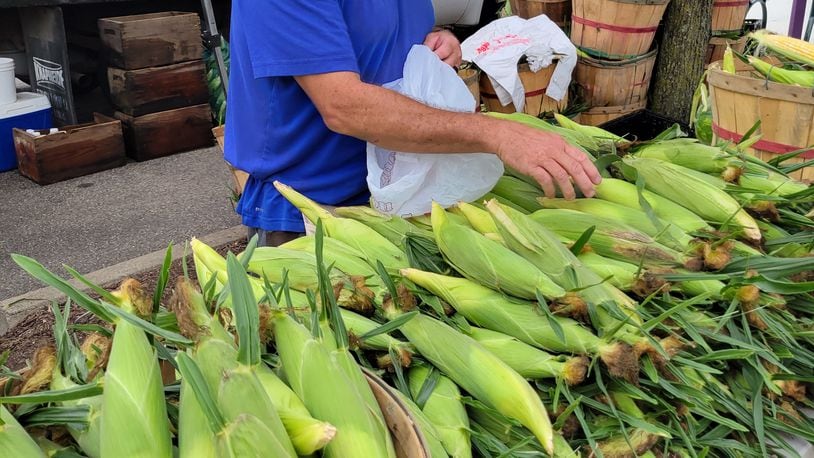 Downing Fruit Farm sells corn at the oxford Farmers Market. CONTRIVUTED