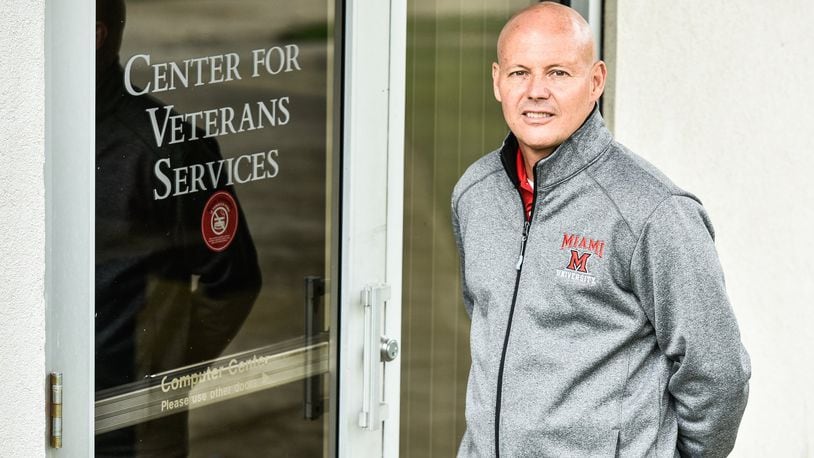 J.P. Smith, Regional Coordinator of Veterans Services for Miami Regionals, stands in front of the Center for Veterans Services on the Miami University Middletown Campus. NICK GRAHAM/STAFF