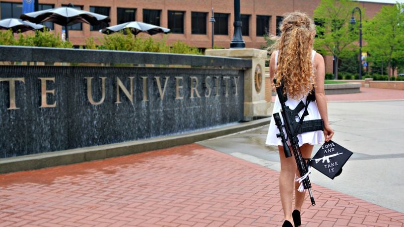 Kaitlin Bennett, a recent graduate from Ohio's Kent State University, posed on campus with her AR-10 in photos that quickly went viral and sparked a heated debate on social media.
