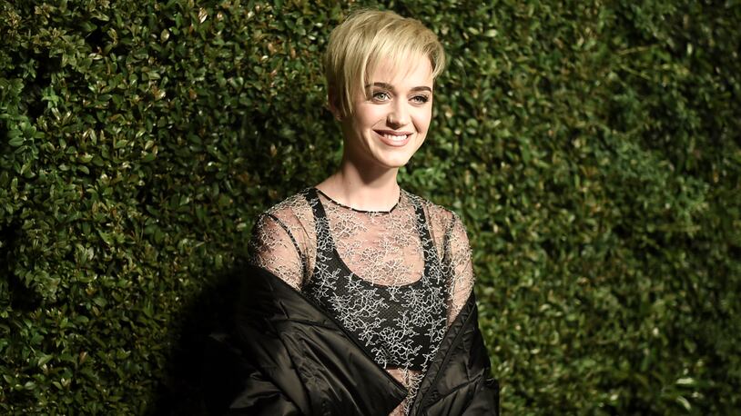 FILE - In this April 6, 2017 file photo, Katy Perry attends the Chanel dinner in Santa Monica, Calif. Perry will join the list of judges on the upcoming "American Idol," singing competition series. (Photo by Richard Shotwell/Invision/AP, File)