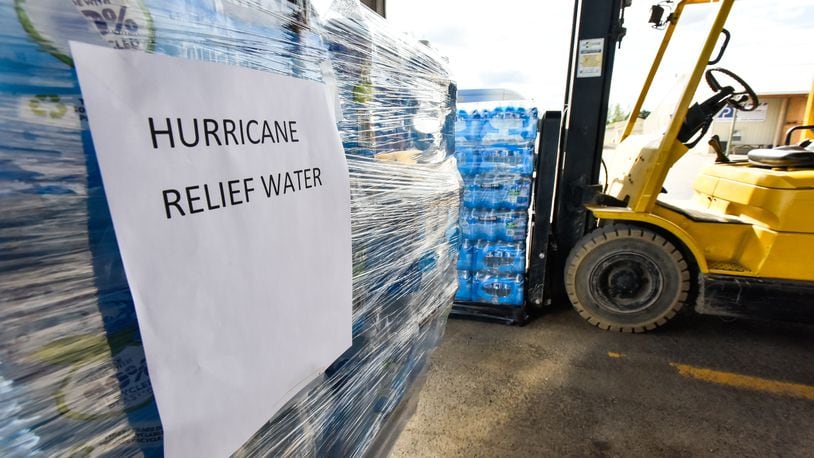 The city of Franklin is partnering with Caring Partners, a local mission resource center, to collect personal hygiene and cleaning supplies as well as bottled water for areas affected by recent hurricanes. NICK GRAHAM/STAFF