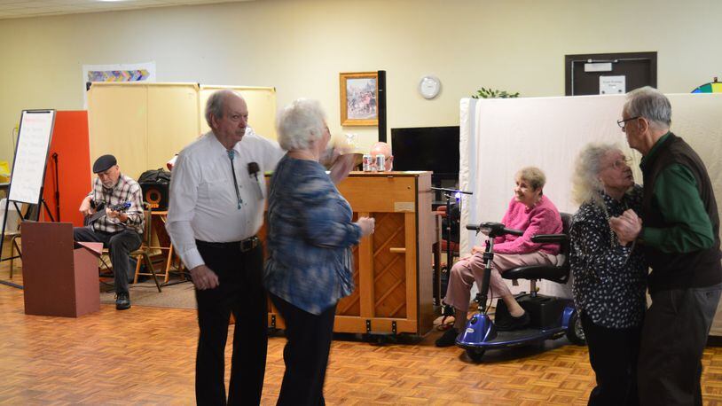 Wednesday afternoon dances at the Oxford Senior Center are growing in popularity. After a month-long test run, the dances are likely to remain in Oxford. Singer Shirley Bennett can be seen seated next to the piano. CONTRIBUTED/BOB RATTERMAN