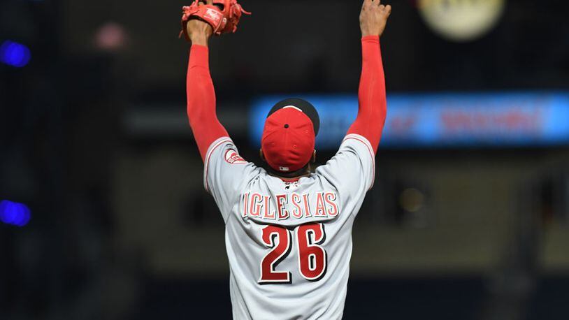 PITTSBURGH, PA - APRIL 11:  Raisel Iglesias #26 of the Cincinnati Reds reacts after the final out in the Cincinnati Reds 6-2 win over the Pittsburgh Pirates at PNC Park on April 11, 2017 in Pittsburgh, Pennsylvania. (Photo by Justin Berl/Getty Images)