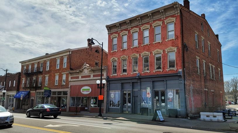 Eight apartments that will be upgraded to "upscale" units are planned for the 100 block of Main St., including at 117 Main, in the same building as the Petals & Wicks store. NICK GRAHAM/STAFF