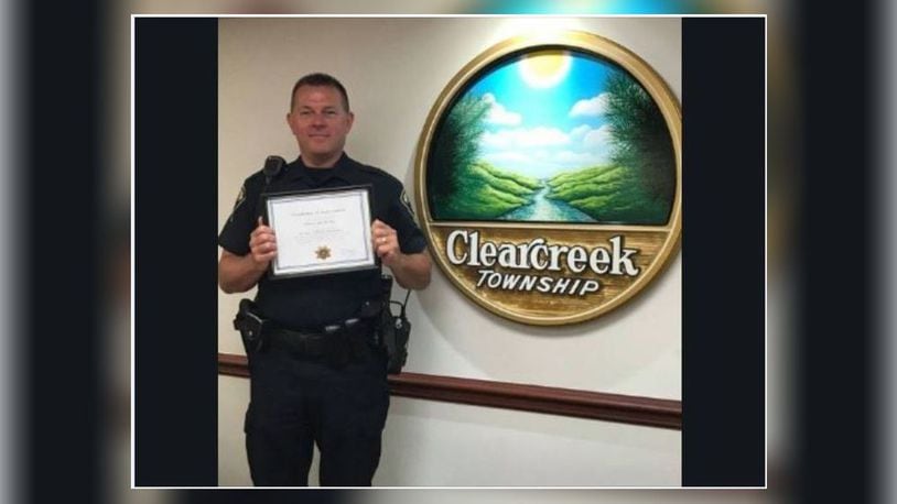 Clearcreek Twp. police officer Eric Ney was presented an award in 2018 marking 10 years of service as an officer as well as 10 years perfect attendance. CONTRIBUTED/CLEARCREEK TWP. POLICE
